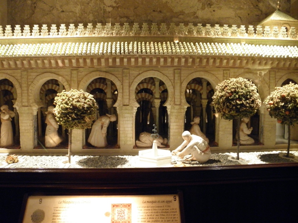 A model of the great masjid of Cordoba and the stages in a person's prayer. The masjid is now a Cathedral and still stands